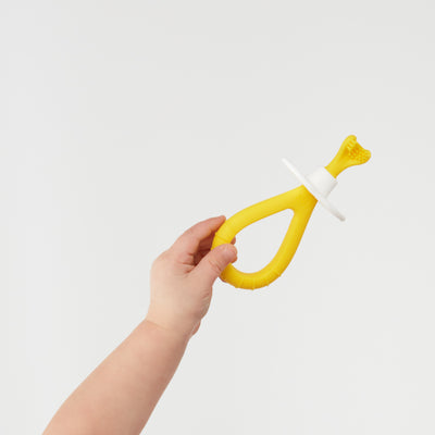 Frida Baby Training Toothbrush for Babies with Soft Silicone Bristles, Yellow
