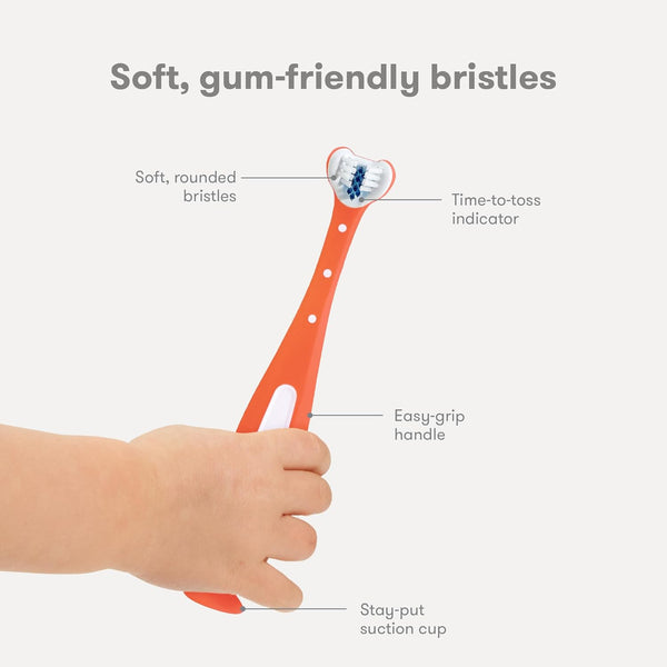 Frida Baby Training Toothbrush | Toddler Toothbrush for 18-24 Months, Easy-Grip Handle, Triple Angle Bristles, Soft Toothbrush Bristles, Stay-Put Suction Cup | Pink