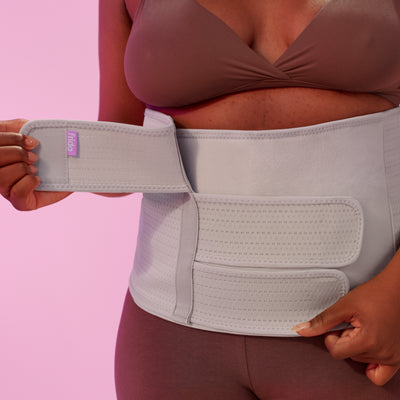 Frida Mom Belly Binder: Postpartum Recovery, Abdominal Support for Natural Delivery & C-Section Recovery, 23cm High Adjustable Compression Wrap