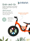 Charlie Glow Orange Kids Balance Bike with Light-Up Wheels | No Batteries Needed | Adjustable | 18-48 months
