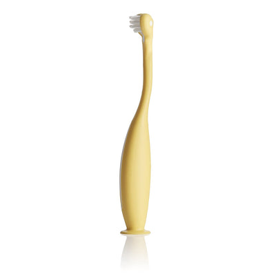 Frida Baby Training Toothbrush | Toddler Toothbrush for 18-24 Months, Easy-Grip Handle, Triple Angle Bristles, Soft Toothbrush Bristles, Stay-Put Suction Cup | Yellow