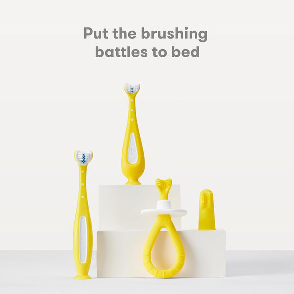 Frida Baby Training Toothbrush | Toddler Toothbrush for 18-24 Months, Easy-Grip Handle, Triple Angle Bristles, Soft Toothbrush Bristles, Stay-Put Suction Cup | Yellow