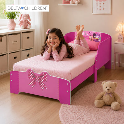 Minnie Mouse Kids Wooden Toddler Bed Frame with Attached Guardrails | Fits Standard Crib Mattress | JPMA Certified Pink Bedroom Furniture | 142.9 x 76.9 x 66.7 CM | 15M+