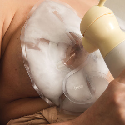 Frida Mom Instant Heat Reusable Breast Warmers - Reusable Click-to-Heat Relief in an Instant for Nursing + Pumping Moms - 2 Sets - 2 Small + 2 Large Heat Packs