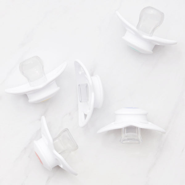 Frida Baby Silicone Paci Weaning System, BPA Free, Latex Free - For kiddos between 6-18 months.
