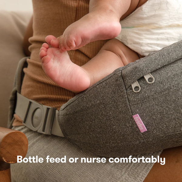 Frida Mom Adjustable Nursing Pillow - Customizable Breastfeeding Pillow for Mom + Baby Comfort with Back Support, Adjustable Wrap Around Waist Strap, Pockets for Heat Relief